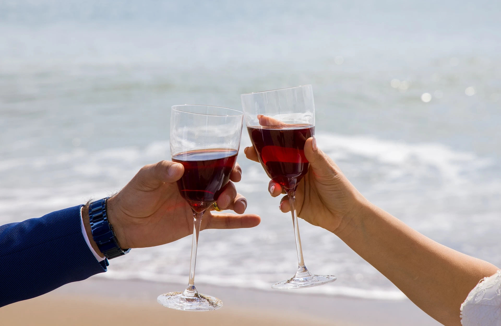 Couple on honeymoon taking wine