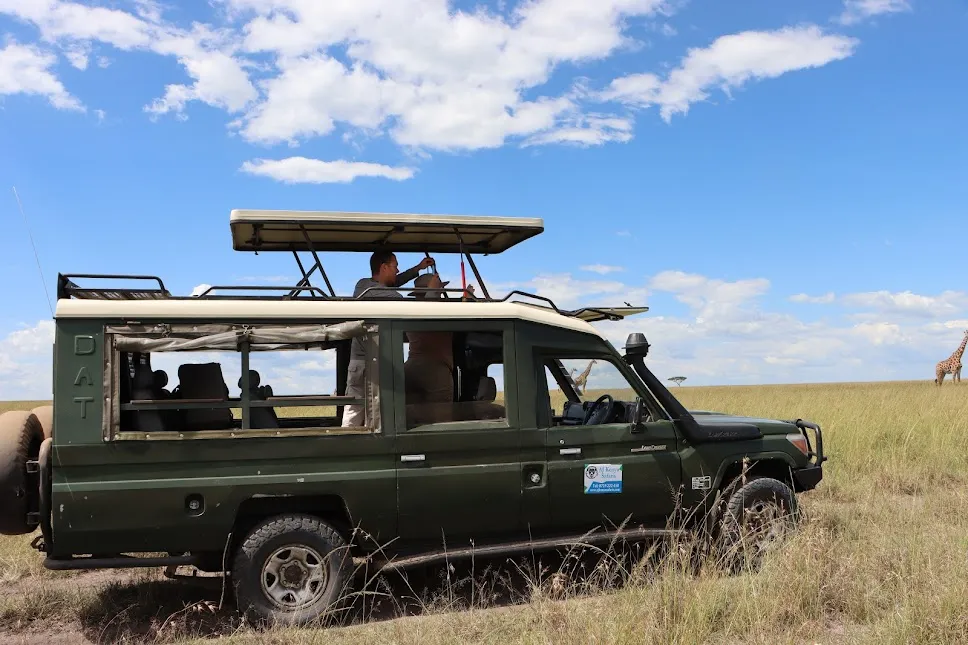 Tanzania great migration p safari vehicle